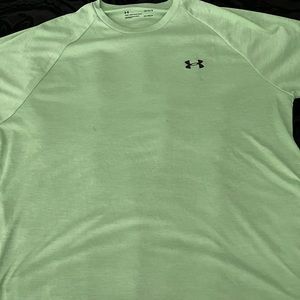 Lime green under armour shirt with 2 blemishes